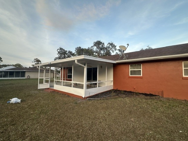 Fresh exterior paint on a stucco house in Volusia County Florida