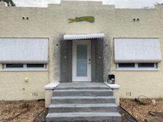 Old Town New Smyrna Beach exterior before painting photo 9